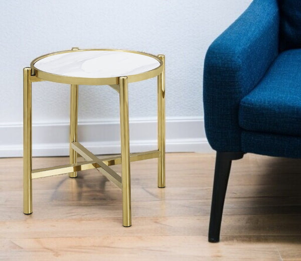 HomeRoots 22" Chic Gold & White Faux Marble Round End Table with Sculptural Metal Cross Legs for Modern Spaces 554641