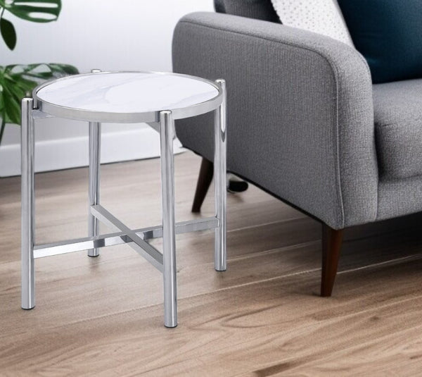 HomeRoots 22" Chic Round End Table with White Faux Marble Top and Sleek Silver Cross Legs for Modern Spaces 554642