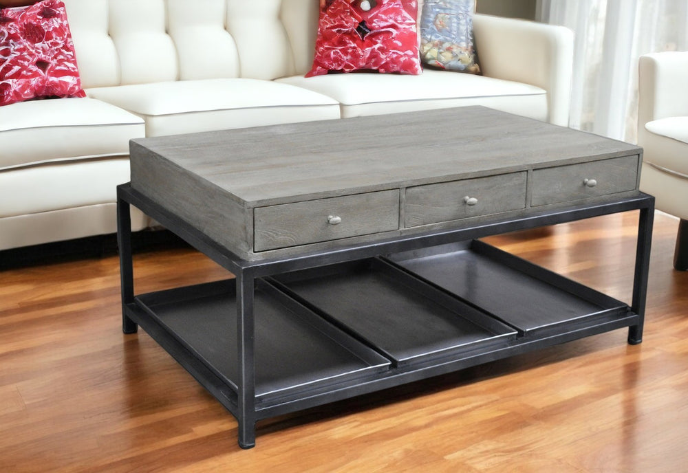 Homeroots 50" Gray And Black Solid Wood And Metal Distressed Coffee Table With Six Drawers And Shelf   554671