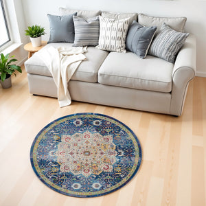 Homeroots 4' Navy Blue And Gold Medallion Distressed Non Skid Round Rug  Polypropylene 554717