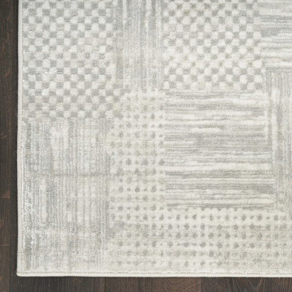 HomeRoots 5' Silver and Gray Abstract Area Rug - Modern Elegance, Non-Skid, Durable, Stain Resistant Design 9' X 12' 554725