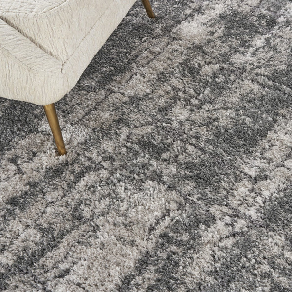 HomeRoots 5' Charcoal and Ivory Abstract Shag Area Rug - Plush, Modern Design for Cozy Living Spaces and Style 8' X 10' 554774