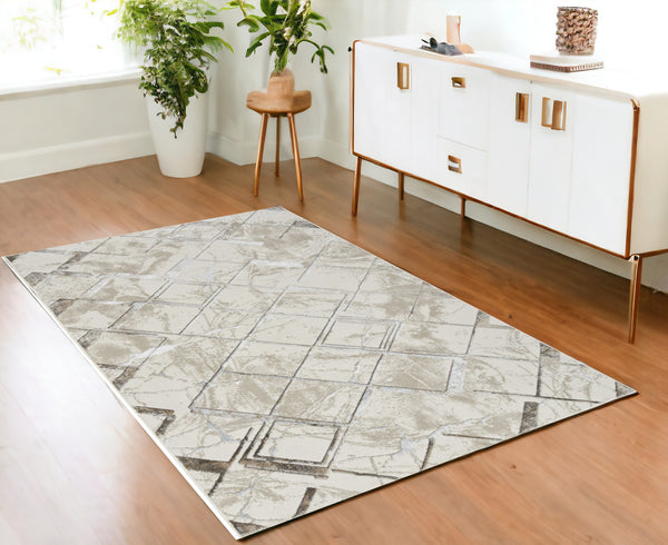 Homeroots 4' X 6' Ivory And Gray Abstract Non Skid Area Rug  Polyester 554784