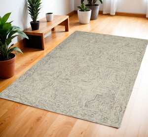 Homeroots 4' X 6' Ivory And Blue Wool Geometric Area Rug  Wool 554827