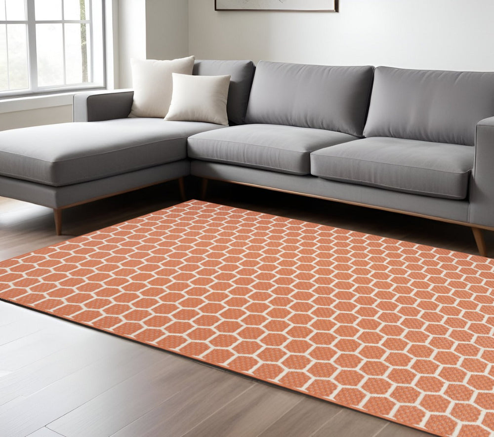 HomeRoots 6' Coral and Ivory Geometric Area Rug – Stylish Indoor/Outdoor Flatwoven Design for Modern Spaces 554834