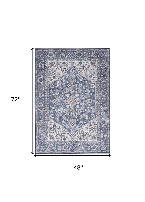 Homeroots 4' X 6' Blue And Ivory Floral Medallion Power Loom Distressed Area Rug  Cotton Blend 554849