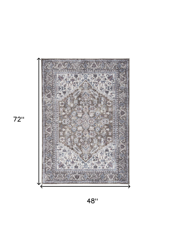Homeroots 4' X 6' Green And Ivory Floral Medallion Power Loom Distressed Area Rug  Cotton Blend 554850
