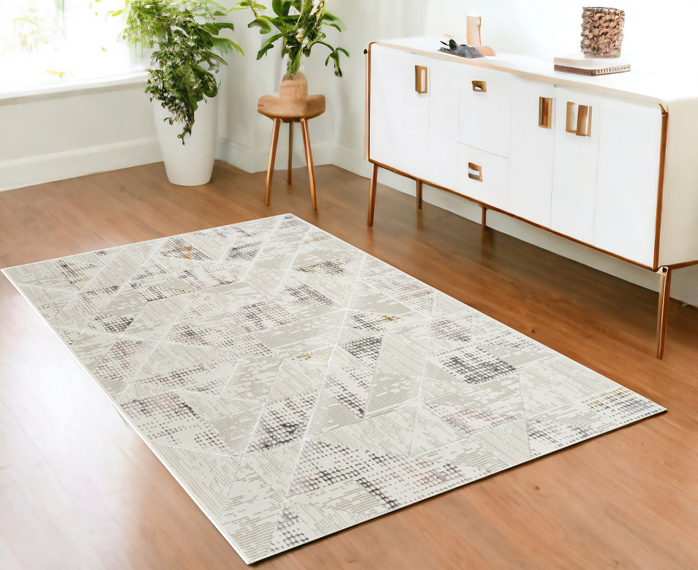 Homeroots 4' X 6' Beige Ivory And Gray Abstract Non Skid Area Rug  Polyester 554877