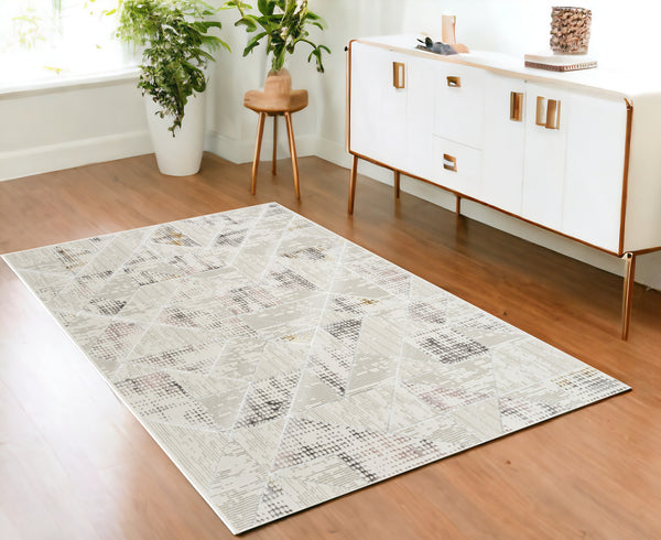Homeroots 4' X 6' Beige Ivory And Gray Abstract Non Skid Area Rug  Polyester 554877