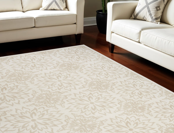 Homeroots 8' X 10' Beige And Ivory Floral Area Rug  Polypropylene 554926