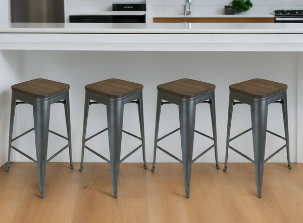 Homeroots Set Of Four 26" Brown And Gunmetal Wood And Metal Backless Counter Height Bar Chairs   555021