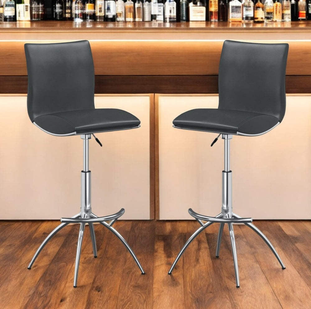 HomeRoots Set of Two Adjustable Gray Faux Leather and Silver Metal Bar Chairs for Modern Dining Spaces 555026