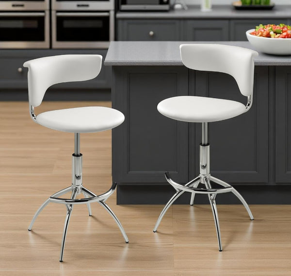 HomeRoots Set of Two Sleek White Faux Leather and Silver Metal Low Back Adjustable Bar Chairs for Modern Spaces 555037