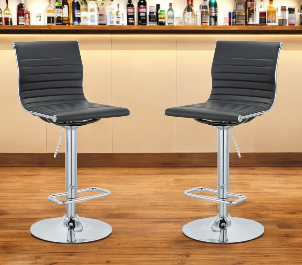 HomeRoots Set of Two Modern Low Back Adjustable Height Bar Chairs in Black Faux Leather & Silver Metal 555042