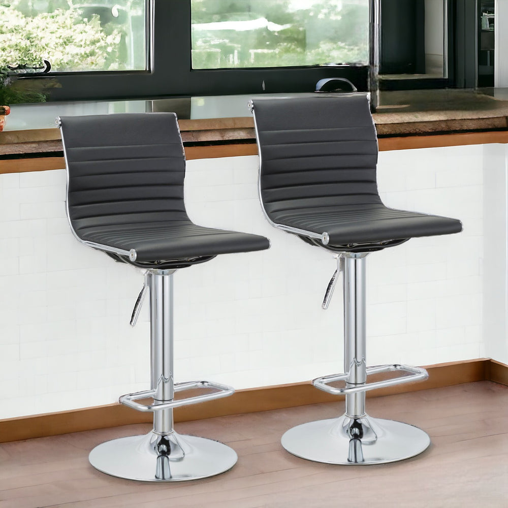 Homeroots Set Of Two Black And Silver Faux Leather And Metal Low Back Adjustable Height Bar Chairs   555042