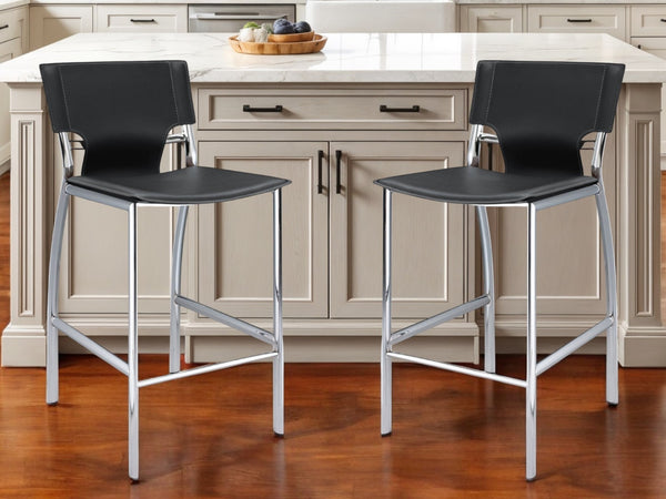 Homeroots Set Of Two 25" Black And Silver Faux Leather And Metal Low Back Counter Height Bar Chairs   555051
