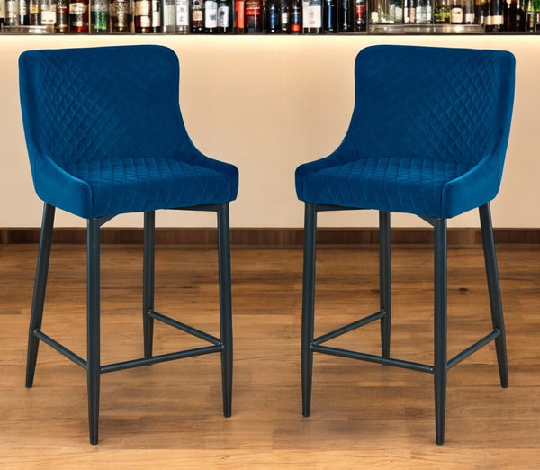 HomeRoots Set of Two Stylish 26" Blue Velvet & Black Metal Counter Height Bar Chairs for Modern Spaces 555057