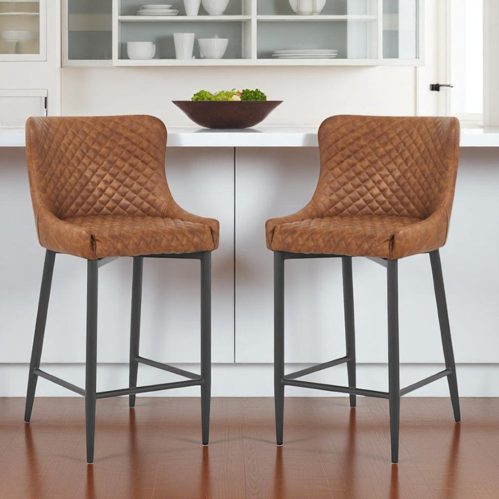 HomeRoots Set of Two 26" Orange Faux Leather and Black Metal Counter-Height Bar Chairs for Modern Comfort 555058