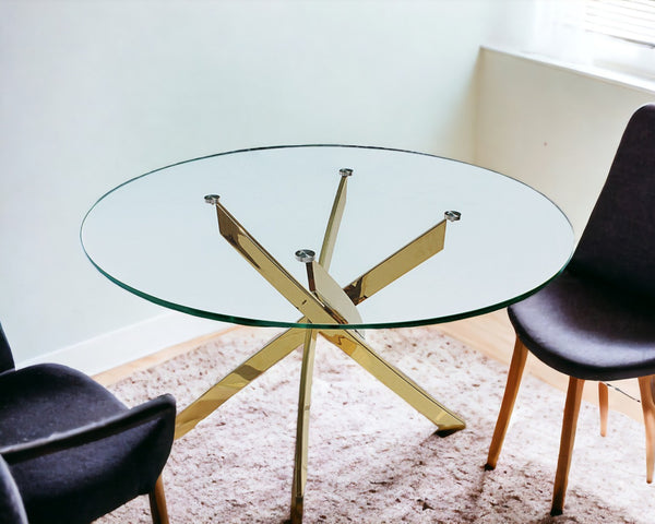 HomeRoots 54" Modern Clear Glass & Gold Metal Cross-Leg Round Dining Table for Elegant Home Gatherings 555139