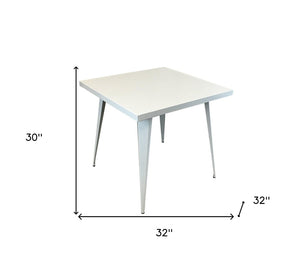HomeRoots 32" White Square Dining Table - Modern Minimalist Steel Design for Compact Spaces, Seats 6 Comfortably 555146