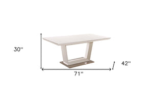 HomeRoots 71" White Wood & Metal Extendable Dining Table with Self-Storing Leaf for Modern Home Gatherings 555166