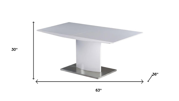 HomeRoots 63" White Metal Pedestal Dining Table with Self-Storing Leaf - Modern, Stylish & Versatile Centerpiece 555173