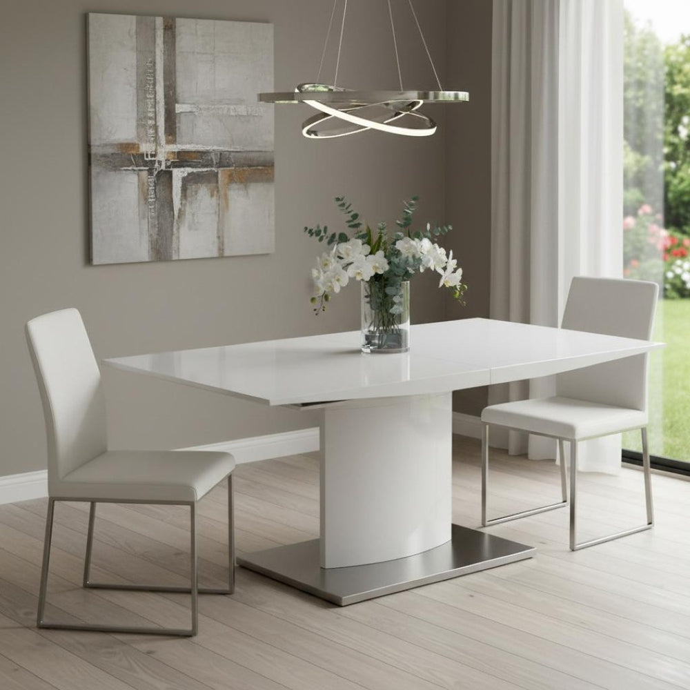 HomeRoots 63" White Metal Pedestal Dining Table with Self-Storing Leaf - Modern, Stylish & Versatile Centerpiece 555173