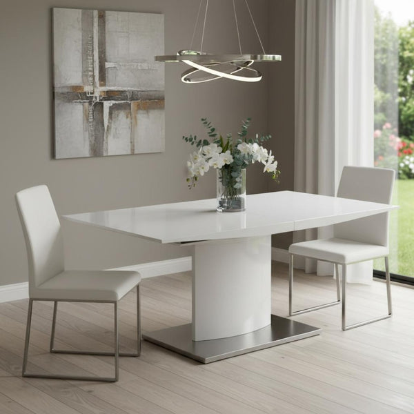 HomeRoots 63" White Metal Pedestal Dining Table with Self-Storing Leaf - Modern, Stylish & Versatile Centerpiece 555173