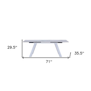 HomeRoots 71" Elegant Gray and White Ceramic Extendable Dining Table with Metal Base for Versatile Spaces 555187