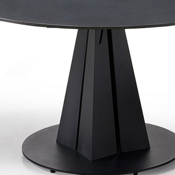 HomeRoots 51" Black Stone & Metal Round Extendable Dining Table with Self-Storing Leaf for Modern Spaces 555192