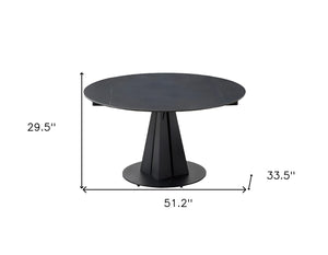 HomeRoots 51" Black Stone & Metal Round Extendable Dining Table with Self-Storing Leaf for Modern Spaces 555192
