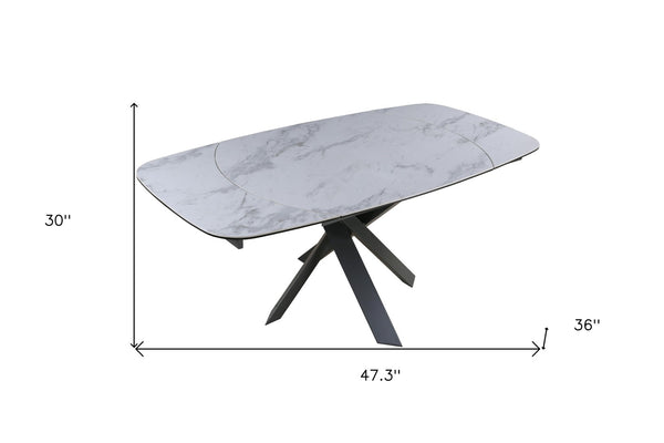 HomeRoots 47" Oval Extendable Dining Table with Gray and White Ceramic Top & Metal Cross-Leg Base for Versatility 555194