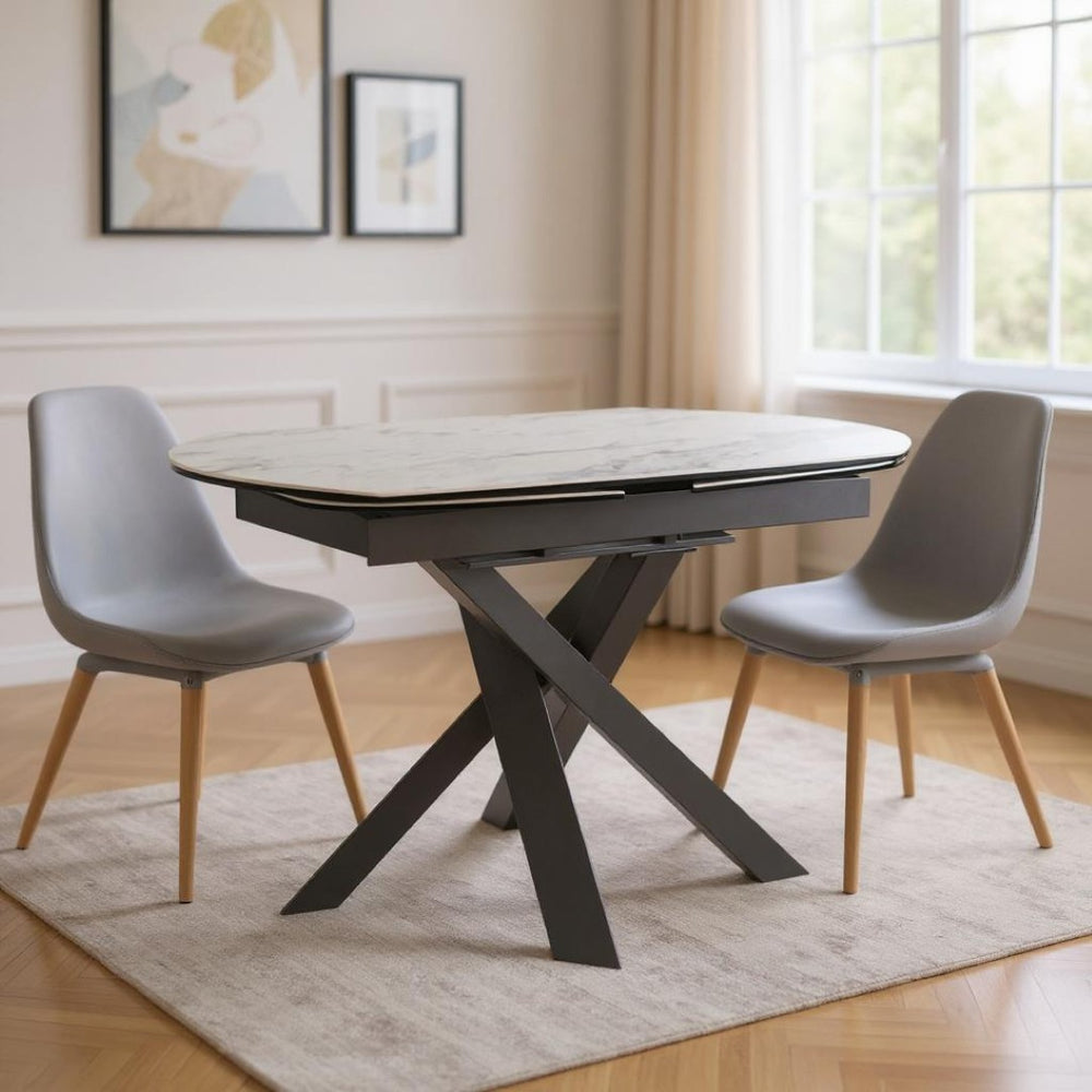 HomeRoots 47" Oval Extendable Dining Table with Gray and White Ceramic Top & Metal Cross-Leg Base for Versatility 555194