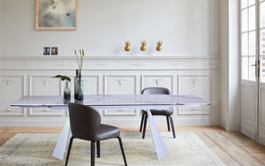 HomeRoots 63" White Ceramic Dining Table with Metal Base - Extendable & Elegant for Modern Gatherings! 555195