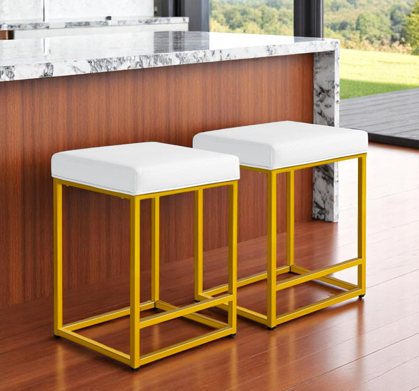 Homeroots Set Of Two 24" White Faux Leather & Gold Metal Backless Bar Chairs For Stylish Dining Spaces   555304