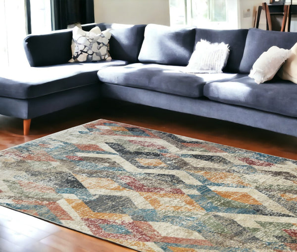 HomeRoots 5' Stylish Beige Blue and Gray Geometric Distressed Area Rug with Short Fringe for Any Space 9' X 13' 555330