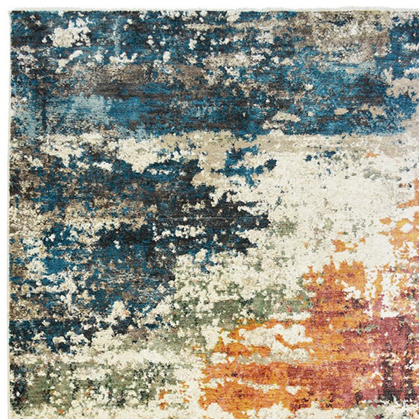 Homeroots 5' X 8' Beige Blue And Ivory Abstract Distressed Area Rug With Fringe  Polyester 555333