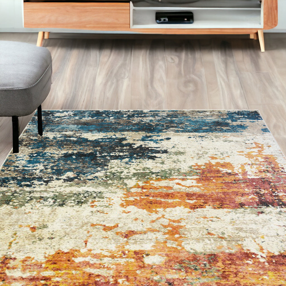 Homeroots 5' X 8' Beige Blue And Ivory Abstract Distressed Area Rug With Fringe  Polyester 555333