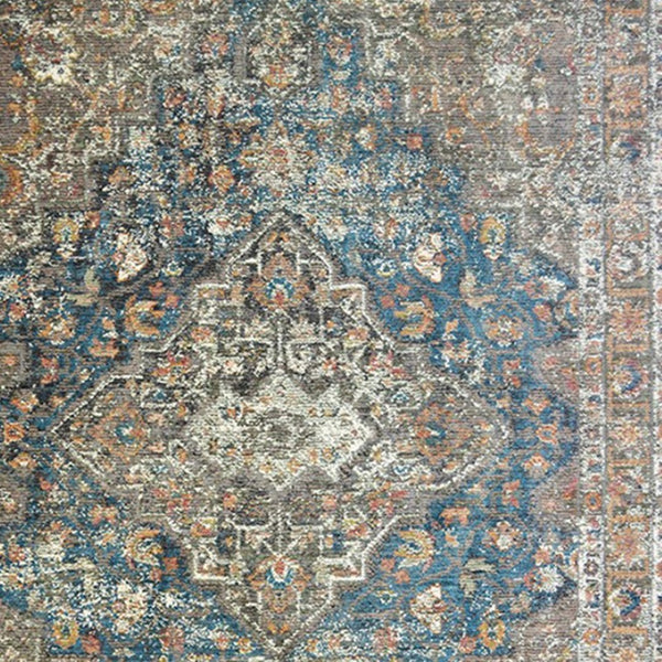 HomeRoots 9' Distressed Blue and Brown Oriental Area Rug with Fringed Edges for Inviting Home Decor 9' X 13' 555345
