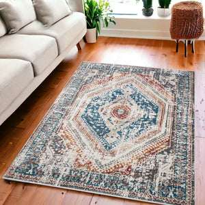 Homeroots 5' X 8' Teal Taupe And Rust Geometric Distressed Area Rug With Fringe  Polyester 555358