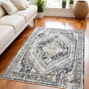 Homeroots 5' X 8' Gray Beige And Blue Geometric Distressed Area Rug With Fringe  Polyester 555363