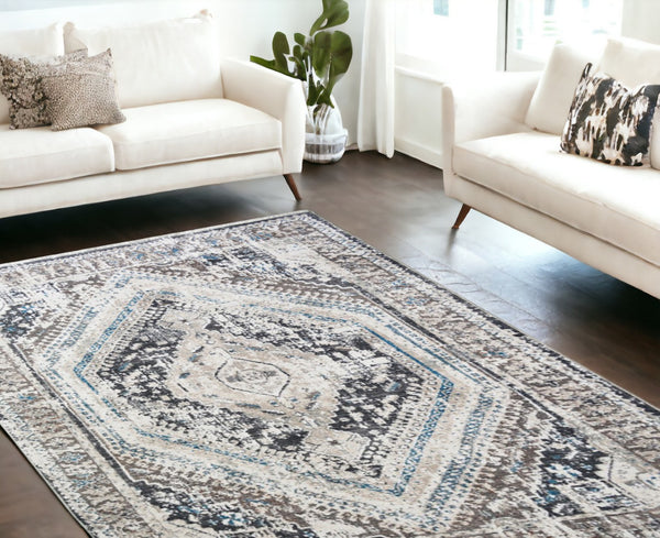 HomeRoots 5' Gray Beige and Blue Geometric Distressed Area Rug with Fringe for Vintage Charm and Durability 9' X 13' 555365