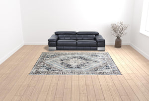 HomeRoots 5' Gray Beige and Blue Geometric Distressed Area Rug with Fringe for Vintage Charm and Durability 9' X 13' 555365