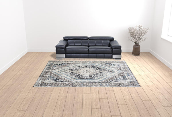 HomeRoots 5' Gray Beige and Blue Geometric Distressed Area Rug with Fringe for Vintage Charm and Durability 9' X 13' 555365