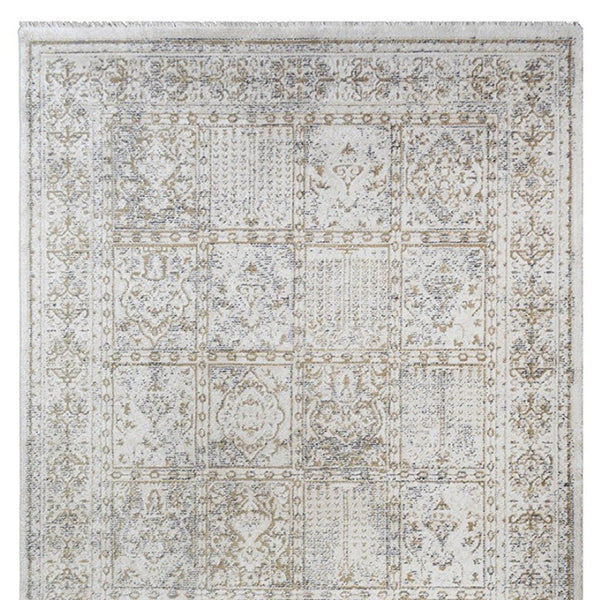 HomeRoots 5' Ivory Oriental Distressed Area Rug with Fringe Tassels – Soft, Stain-Resistant, Timeless Style 8' X 10' 555369
