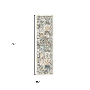 HomeRoots 8' Stylish Ivory Blue and Gray Distressed Patchwork Runner Rug with Fringe for Homes and Halls 555372