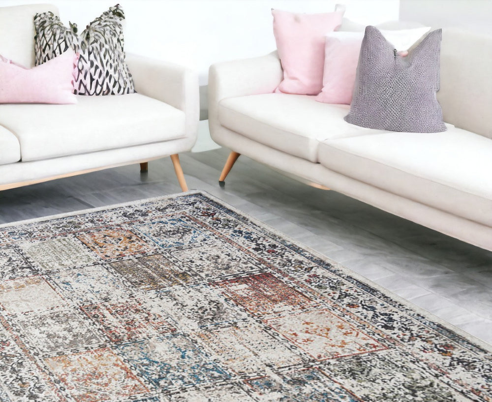 HomeRoots 5' Ivory Oriental Distressed Area Rug with Tasseled Fringe - Timeless Elegance for Any Room 9' X 13' 555375