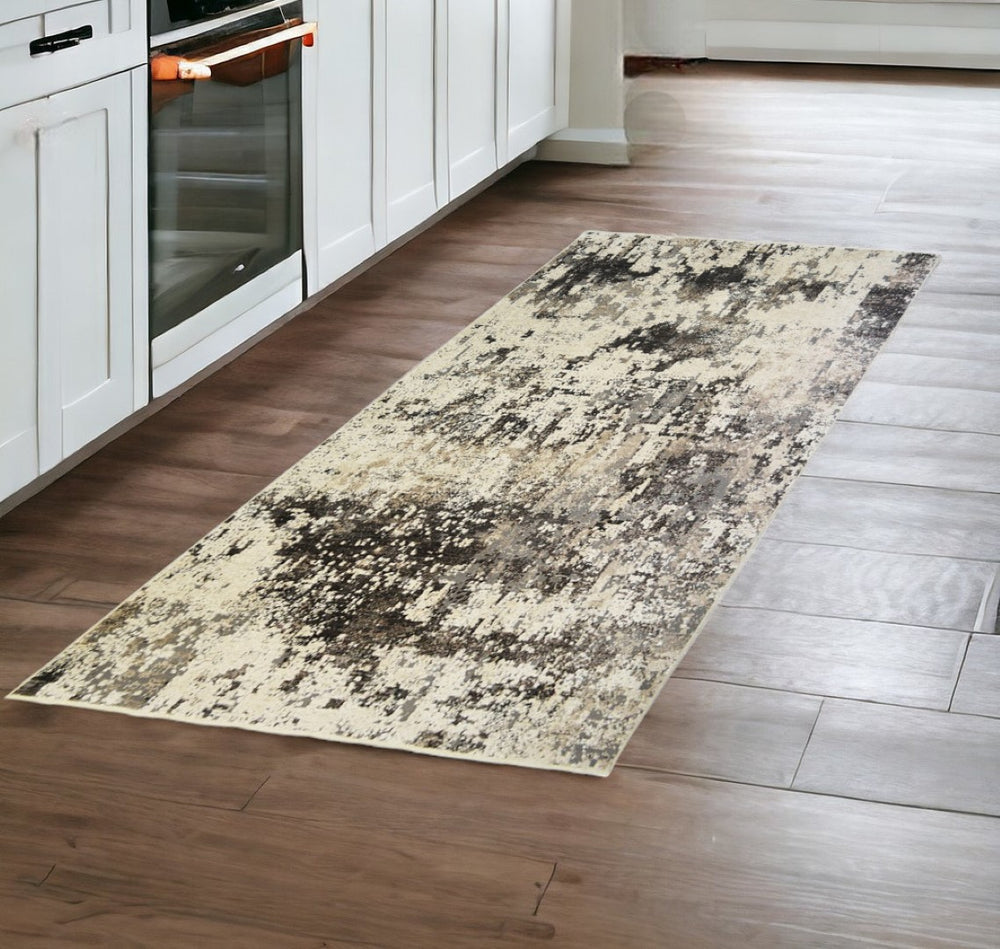 HomeRoots 8' Black Abstract Distressed Runner Rug with Classic Tassel Fringe - Modern Artistry for Your Home 555392