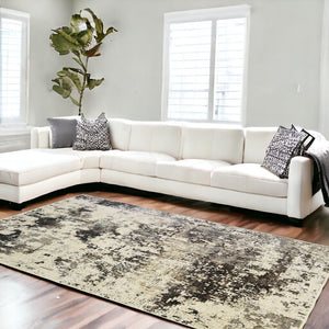 Homeroots 9' X 13' Black Abstract Distressed Area Rug With Fringe  Polyester 555395