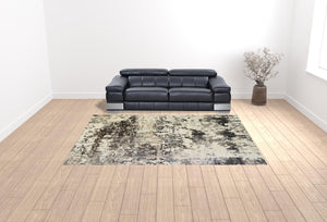 Homeroots 9' X 13' Black Abstract Distressed Area Rug With Fringe  Polyester 555395